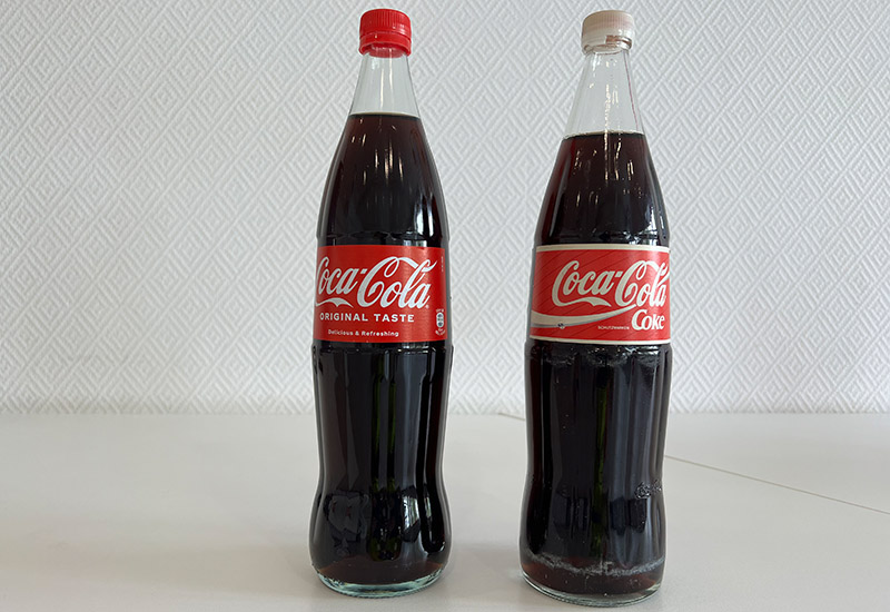 Alte und neue Coca-Cola Glasflasche